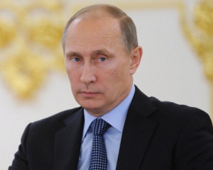Путин пытается наладить диалог с Порошенко - политолог