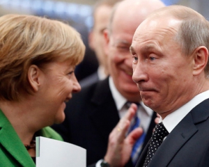 Россияне выбрали Путина и Меркель &quot;людьми года&quot;