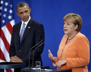Обама и Меркель советуют ускориться с выполнением Минского соглашения