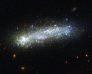 У NASA показали фото рідкісної галактики з "дитячим обличчям"