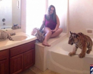 Жінка тримала вдома тигрів, пантеру, лиса, скунса і мавп
