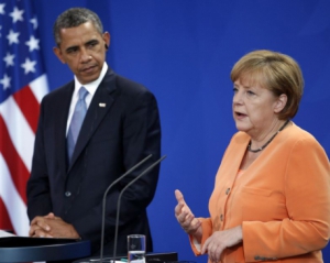 Обама и Меркель выпустили совместную статью