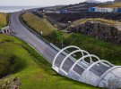 Тунель Естуройартуннлінн почали споруджувати 2017-го. сполучить острів Стреймой із двома частинами острова Естуроя, розділеними невеликим затокою. Складатиметься з трьох окремих доріг. Вони будуть з'єднуватися за допомогою кругової розв'язки