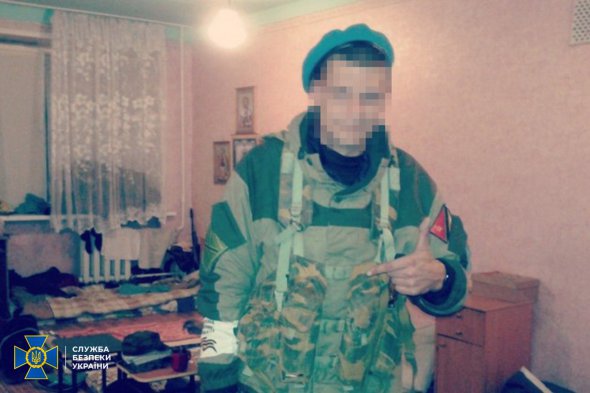 На фотографии заочно приговорен к 10 годам тюрьмы боевик "Миха"