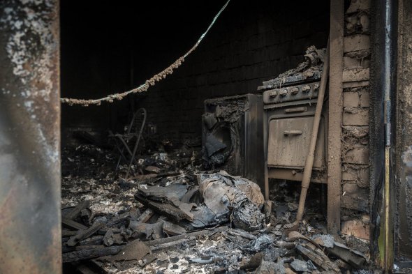 Останки тіла жінки, яка, за словами місцевих, сховалась у своєму гаражі під час штурму росіянами