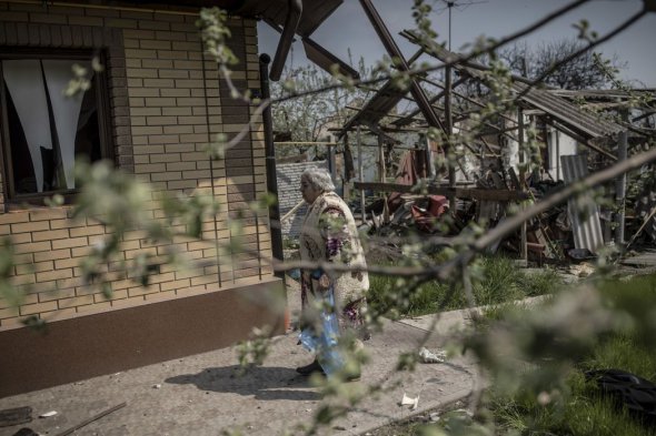 Поврежденные в результате обстрела дома в Ольховке под Харьковом, в районе контрнаступления украинских сил 