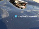 Разбитый автомобиль в результате российской ракетной атаки на Днепр