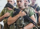 Захисники й захисниці, які тримають Україну