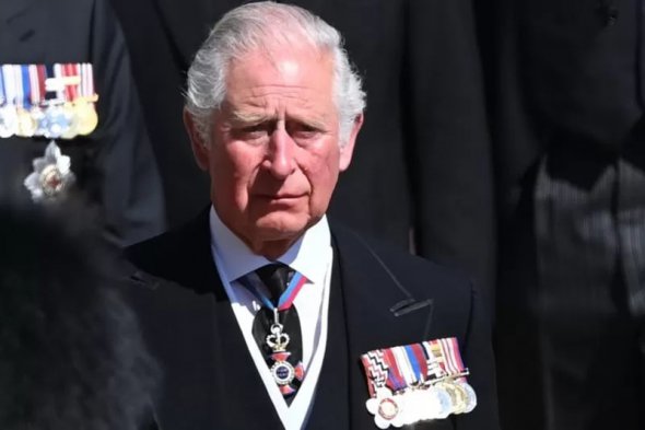 Король возглавлял процессию за гробом своего отца, принца Филиппа во время похорон в Виндзорском замке в 2021 году