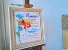 22 января Тариэла Чекуришвили поздравляли с 75-летием, плакат остался в холле до завершения выставки художника