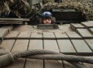 На світлинах зображені українські військові, які протистоять повномасштабному вторгненню російських