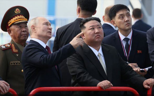 Владимир Путин и лидер Северной Кореи Ким Чен Ин 