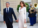 Ніколя Саркозі з дружиною Карлою Бруні