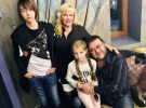 Светлана и Виталий Белоножки с внуками