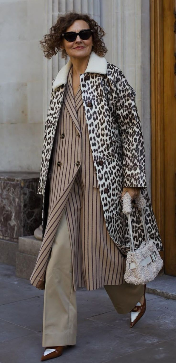 Андре Тан назвав актуальні фасони пальт цієї осені - від кейпів і пончо до оверсайз-моделей і анімалістичних принтів