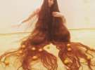27-річна латвійка Алія Насирова хизується у мережі волоссям довжиною у 2,2 м. 
