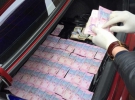Гроші, вилучені в підозрюваного співробітника ДФС