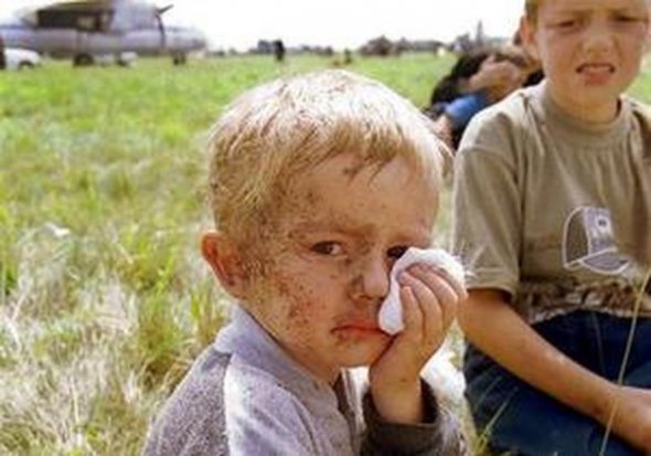 3-летний Остап Хмиль, 2002 год. В Скниловской трагедии потерял мать и бабушку