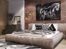 Интерьер спальни: удачное сочетание кирпичной стены и современной мебели