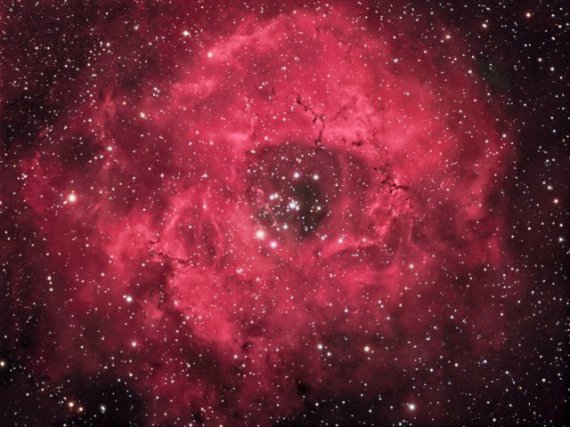 Космічна троянда - туманність Розетка в сузір'ї Єдиноріг