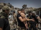 Категория "Фотография года": мальчик, которого удалось забрать с лап боевиков Исламского государства