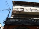 У центрі Івано-Франківська  обвалилася частина  балкона на третьому поверсі будинку, коли там стояла 87-річна жінка