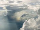 Фото хмар з відкритої кабіни літака