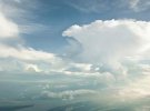 Фото хмар з відкритої кабіни літака