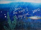 «Радостную» тему продолжили на граффити в переходе под мостом реки Салгир в Симферополе