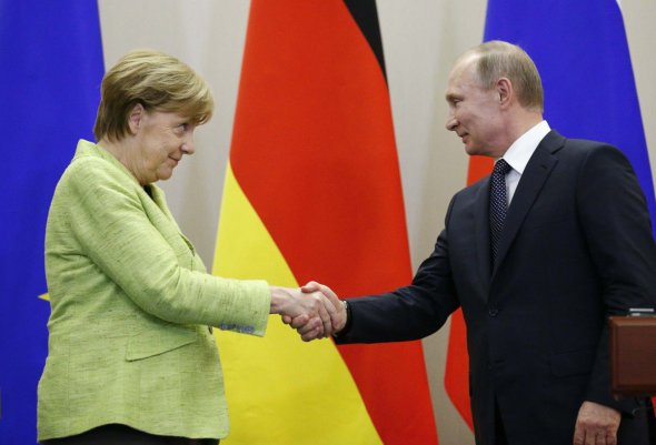 Ангела Меркель на встрече с Владимиром Путиным 18 августа 2018 года в дворце Мезеберг под Берлином