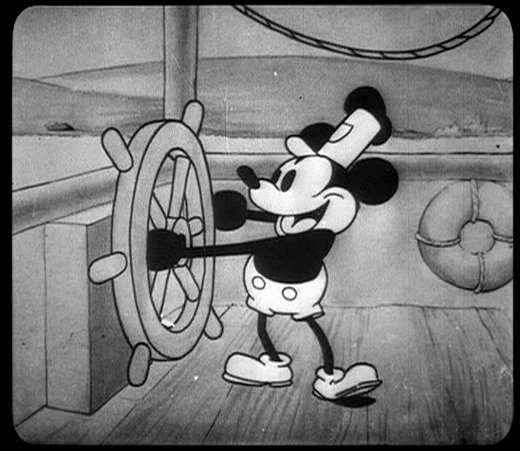 В 1928 году в Нью-Йорке прошла премьера первого звукового мультфильма Уолта Диснея «Пароход Вилли». Фото: Википедия
