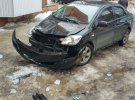 У Полтаві сніг та лід розтрощив авто