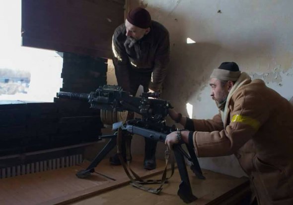 Володимир Регеша стріляє з автоматичного гранатомета