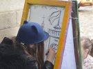 На Площади Рынок организовали мастер-класс рисунка на стекле «Как-то во Львове»