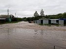 Паводок в Сибири затопил города и дороги