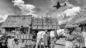 ­Радянський літак ­пролітає над  волинським селом у чесько-словацько-українській драмі ”Пофарбоване пташеня”. Дія картини відбувається під час Другої світової війни