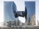 Автором проекту є британська компанія Zaha Hadid Architects, яку заснувала “королева кривої” й перша жінка-лауреатка Прітцкерівської премії Заха Хадід.