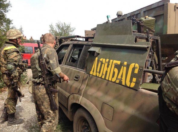 Бойцы "Донбасса" во время второго штурма Иловайская 18 августа 2014 года. Воины обошли все укрепления боевиков со стороны и зашли в Иловайск