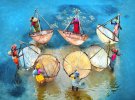Женщины ловят рыбу в Западной Бенгалии, прежде чем отправиться на рынок