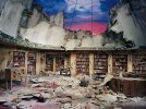 По этой библиотеке прошелся торнадо или это последствия падения метеорита. Крыша обвалилась, и обломки рассыпались по всему полу.