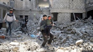 Жертвы бомбардировок в Восточной Гуте. Сирия, 21 февраля 2018 г. Фото: Reuters