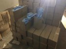 У Києві правоохоронці затримали групу зловмисників, які зі зброєю вкрали у підприємців 100 тис. медичних масок