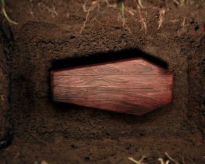Работник кладбища похоронил себя заживо