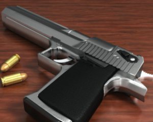 Двухлетний мальчик выстрелил в родителей из пистолета