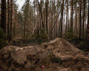 В лесу возле Бучи нашли еще одного расстрелянного оккупантами украинца