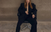 Чорний костюм без білизни: Тіна Кароль знялась у нетиповому для себе образі