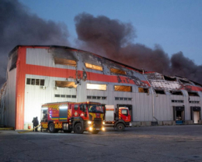 Після обстрілу загорівся склад з технікою - фото