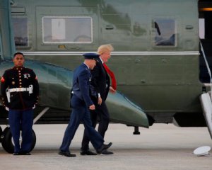 Трамп боровся з вітром заради кашкету військового