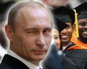 Путин ущипнул молодого африканца