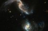 Астрономы сняли на видео слияния двух галактик